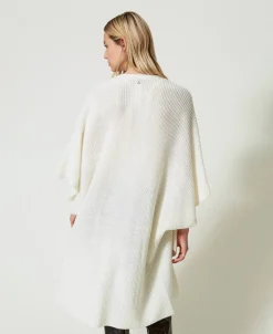 Strickponcho Mit Stickereien